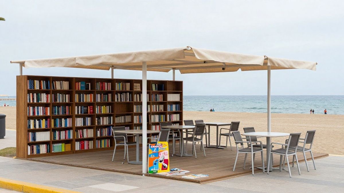 Imagen ilustrativa: un puesto de biblioteca en la playa con libros y sombrillas en una pasarela de madera, con el mar al fondo