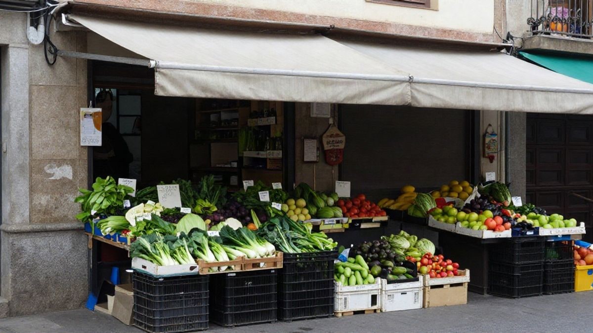 Imagen ilustrativa: puesto de frutas y verduras en un mercado al aire libre en una calle de Barcelona