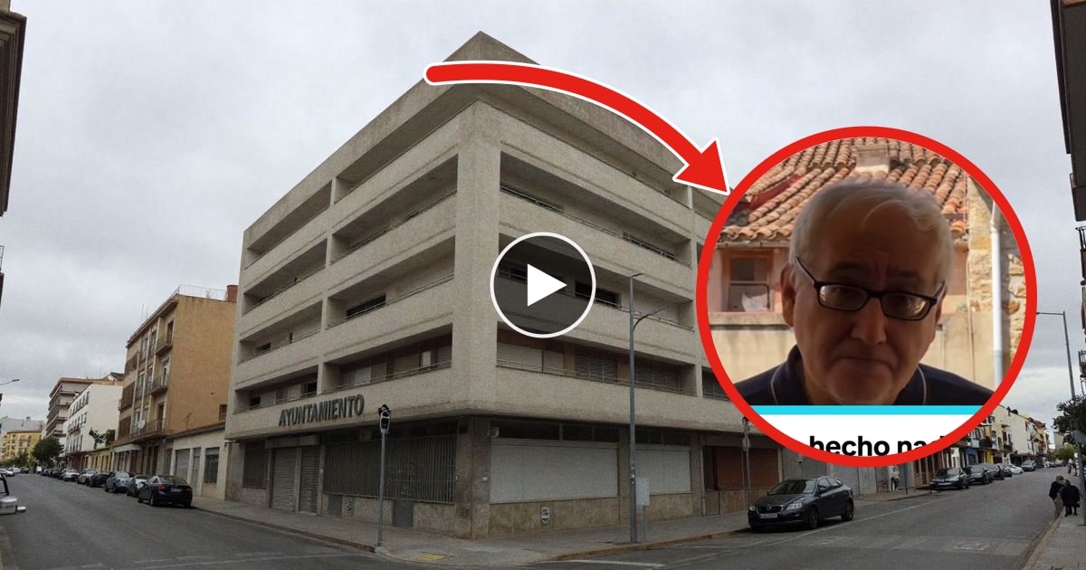 Imagen ilustrativa: fachada genérica de un edificio institucional en una calle de Barcelona, con cielo nublado y algunos coches aparcados.